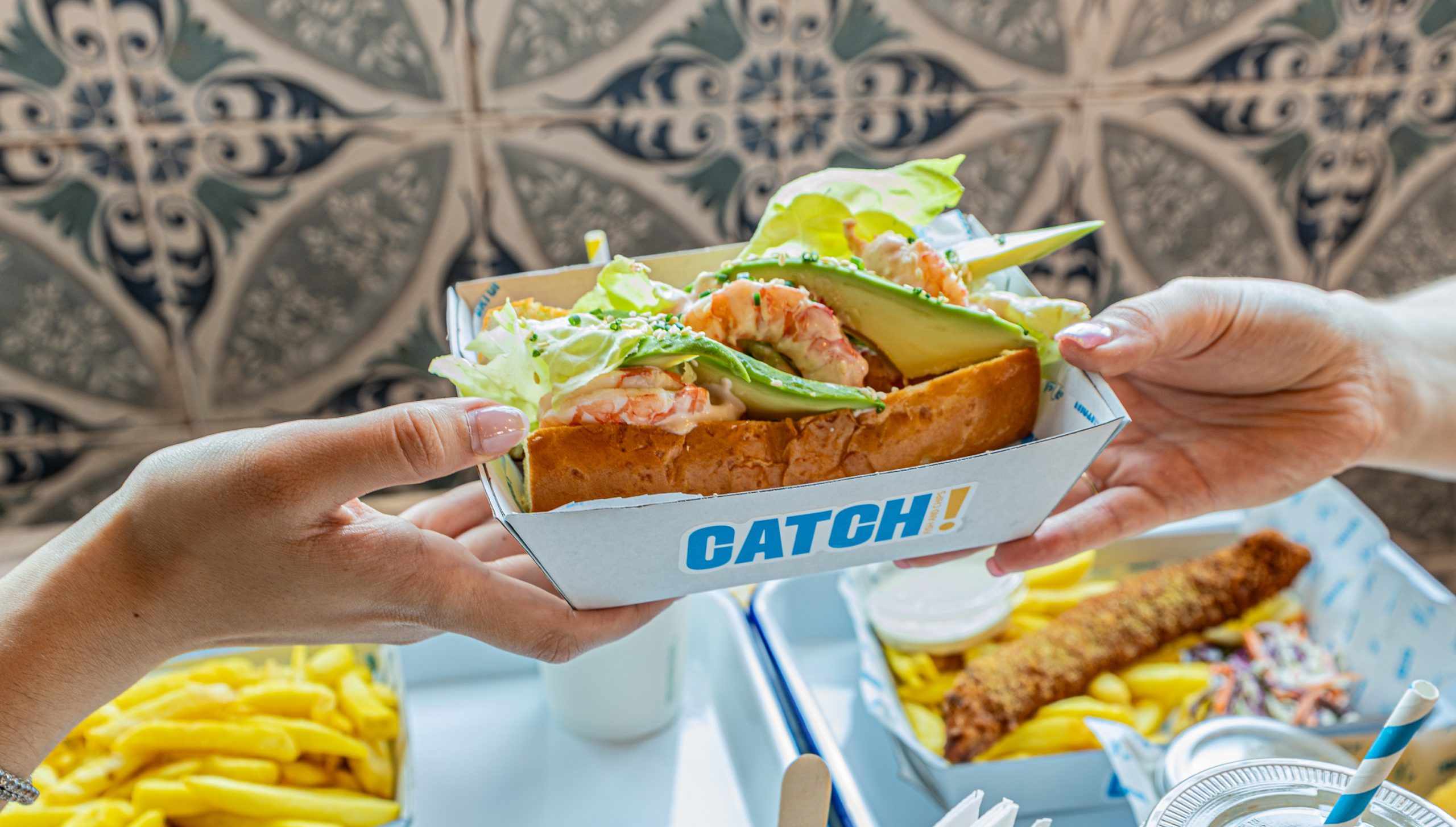 Catch Fish and Chips Group Shot Prawn Roll